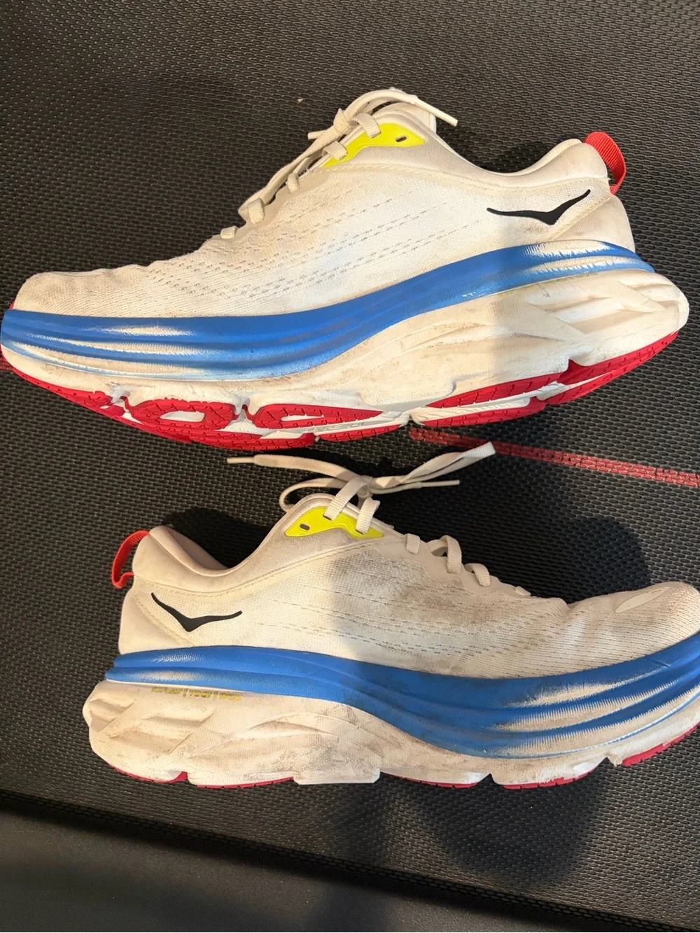 Hoka White Trainers with Blue Midsole and Red Outsole